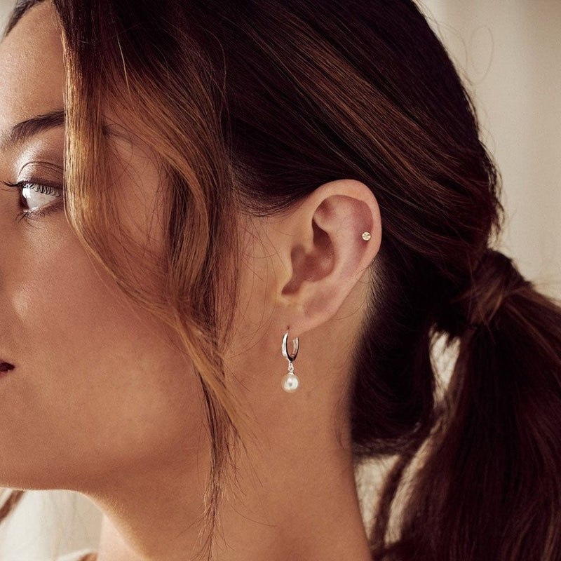 Huggie Hoops Pearl Drop Huggie Hoop Earrings - Silver Orelia Jewellery
