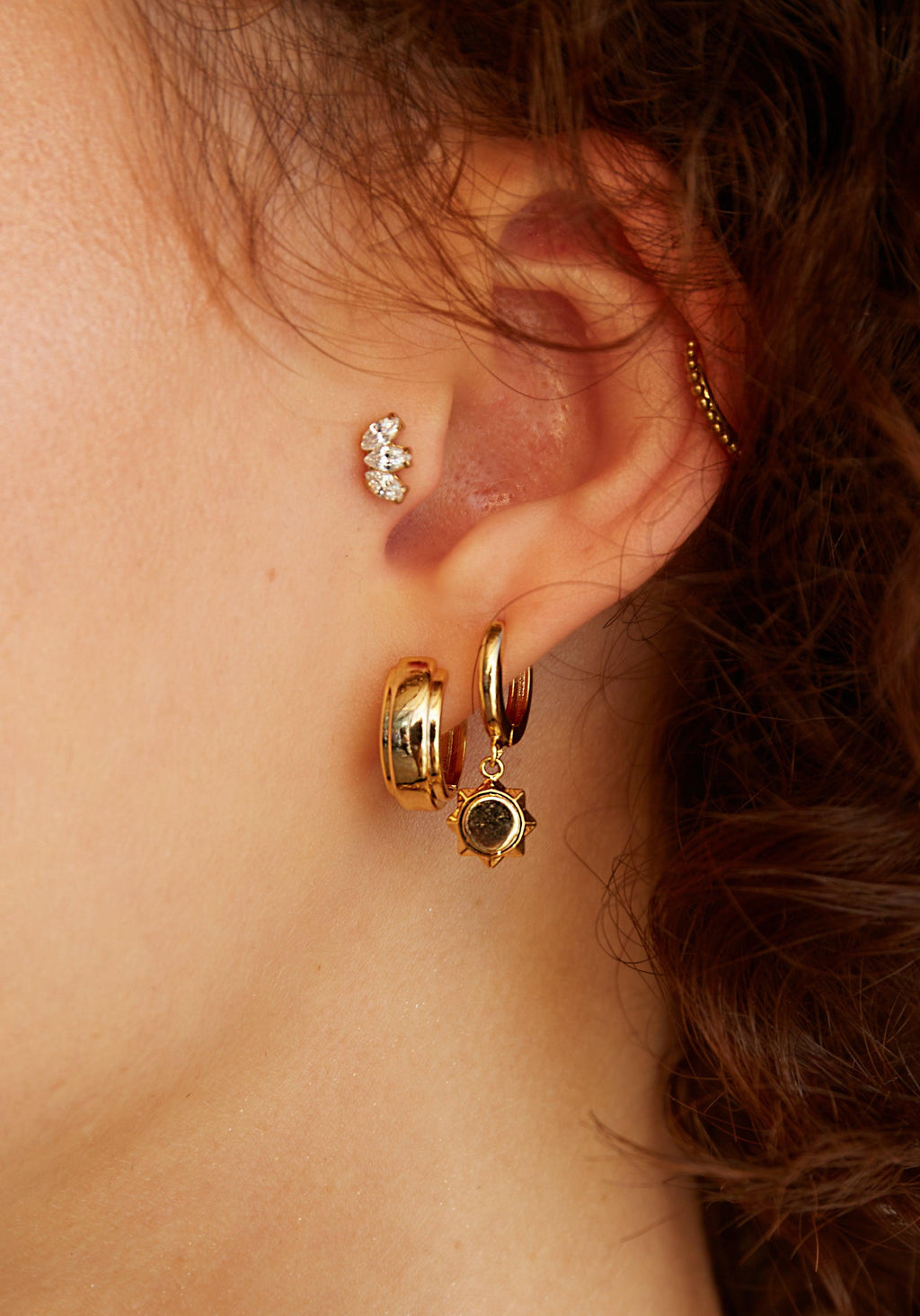 Not on the high clearance street huggie earrings