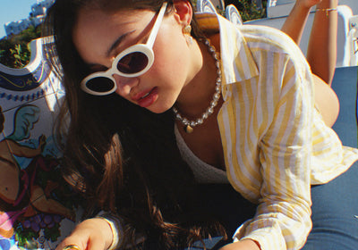 model_on_beach_wearing_summer_jewellery