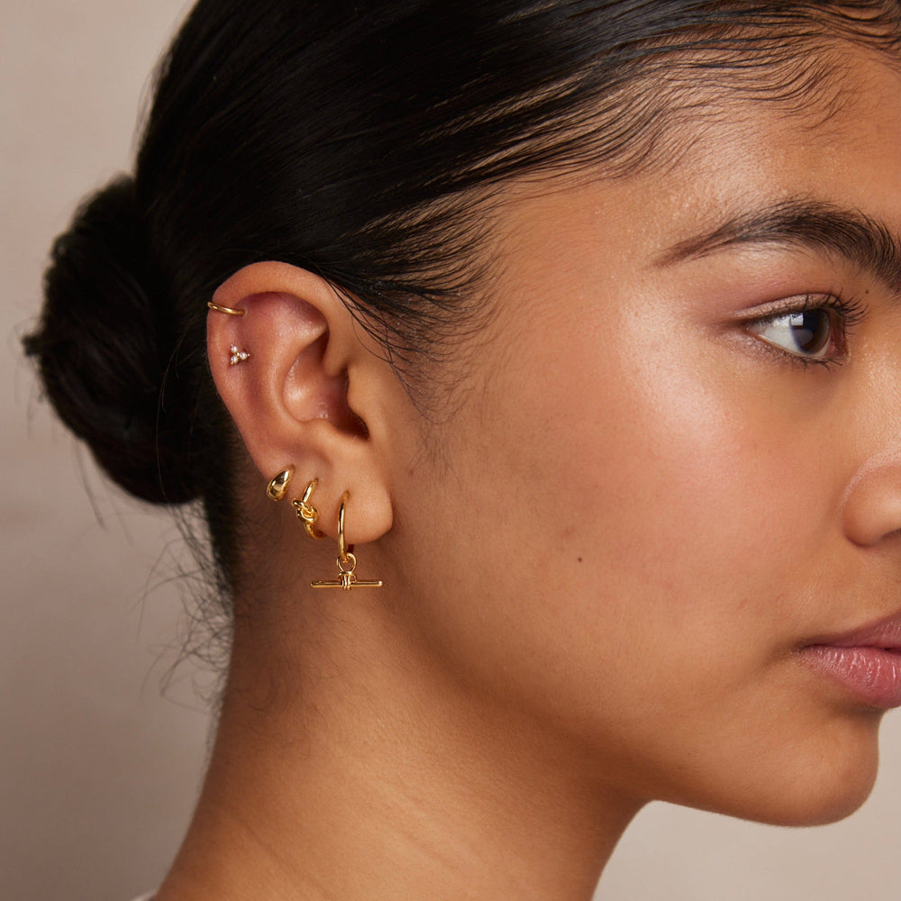 Huggie Hoop Earrings Polished Knot Huggie Hoop Earrings - Gold Orelia Jewellery