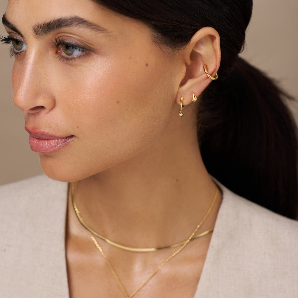 Huggie Hoops Starburst Pavé Micro Huggie Hoop Earrings - Gold Orelia Jewellery